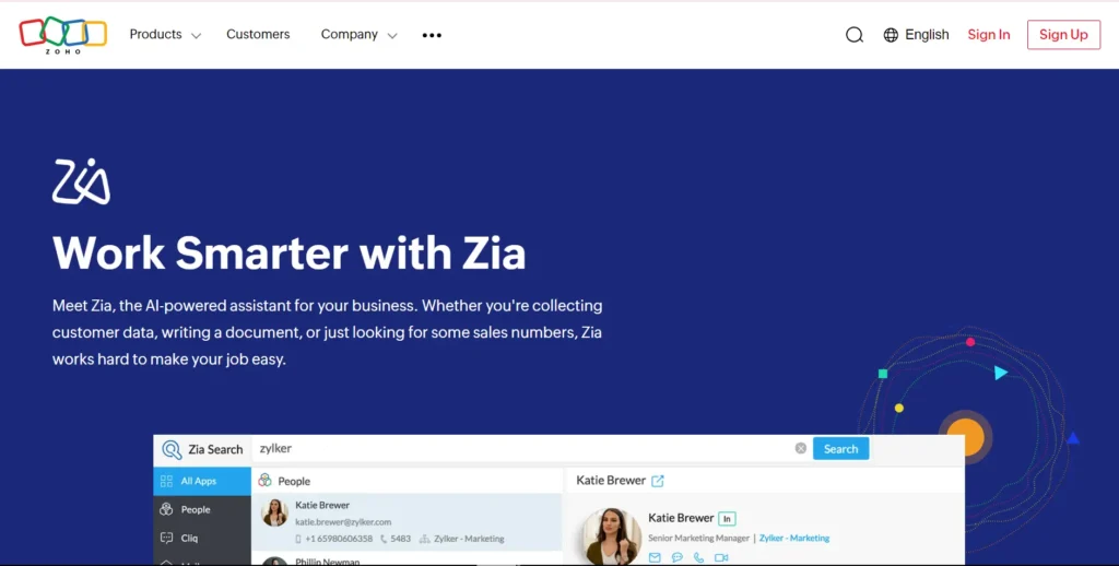 The image shows a webpage from Zoho promoting its AI-powered assistant, Zia. The headline "Work Smarter with Zia" is displayed prominently. Zia is described as an AI tool that helps businesses with tasks like collecting customer data, writing documents, or finding sales numbers, streamlining processes to make work easier. Below the text, there is a mockup of a Zia search interface, featuring a search bar and information about a person, "Katie Brewer," including contact details and job role. The design features a blue background and clean, modern elements, emphasizing productivity and ease of use with Zia.